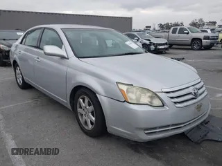 2005 Toyota Avalon XL with VIN 4T1BK36B25U036071, listed as a IAAI auction lot 42100456 with 185,898 mi miles and . Bid and sale history available at carsss.com. Image 1.
