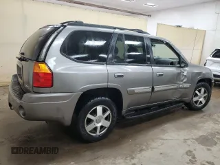 2005 GMC Envoy SLE with VIN 1GKDS13S952383743, listed as a Copart auction lot 43797315 with 185,833 mi miles and Salvage title. Bid and sale history available at DreamBid. Image 3.