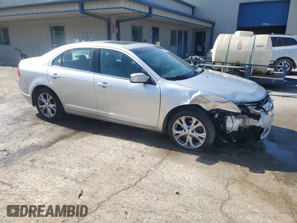 2012 Ford Fusion SE with VIN 3FAHP0HGXCR331498, listed as a Copart auction lot 61859325 with 61,445 mi miles and Salvage title. Bid and sale history available at DreamBid. Image 4.
