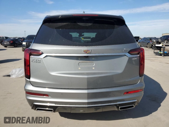 2023 Cadillac XT6 FWD Premium Luxury with VIN 1GYKPCRS4PZ124119, listed as a Copart auction lot 87836515 with 14,752 mi miles and Salvage title. Bid and sale history available at DreamBid. Image 6.
