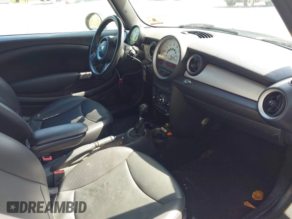 2013 MINI Convertible with VIN WMWZN3C58DT135598, listed as a IAAI auction lot 42122817 with 120,638 mi miles and . Bid and sale history available at DreamBid. Image 5.