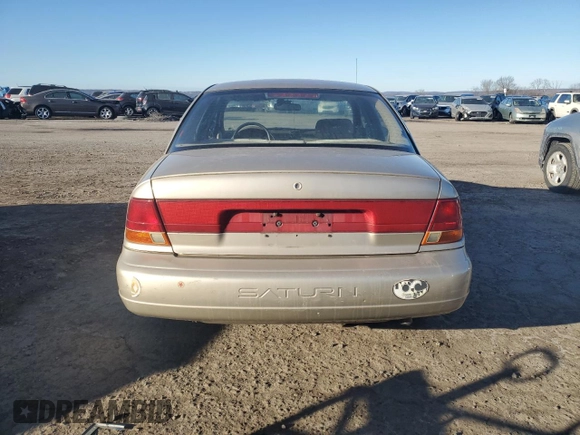 1999 Saturn SL with VIN 1G8ZK5270XZ147170, listed as a Copart auction lot 42169385 with 141,100 mi miles and Clean title. Bid and sale history available at DreamBid. Image 6.
