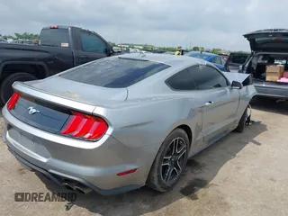 2020 Ford Mustang EcoBoost z VIN 1FA6P8TH2L5186210, wystawiony jako IAAI lot #42103657 z przebiegiem 68 790 mil mil oraz . Historia ofert i sprzedaży dostępna na DreamBid. Obrazek 4.