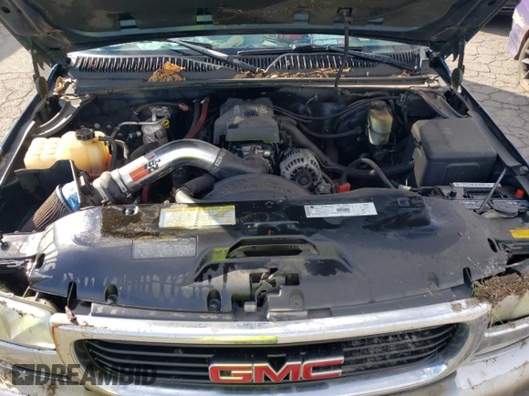 1999 GMC Sierra 1500 SLE z VIN 1GTEK19T7XZ531950, wystawiony jako Copart lot #44424965 z przebiegiem 151 343 mil mil oraz Szkoda całkowita • Salvage title. Historia ofert i sprzedaży dostępna na DreamBid. Obrazek 11.