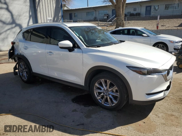 2019 Mazda CX-5 Grand Touring with VIN JM3KFADM4K1674408, listed as a Copart auction lot 47684015 with 77,554 mi miles and Salvage Title. Bid and sale history available at carsss.com. Image 4.
