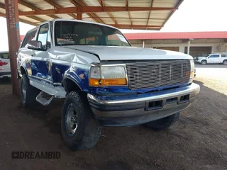 1996 Ford Bronco Custom with VIN 1FMEU15H3TLB30609, listed as a IAAI auction lot 42053896 with 238,597 mi miles. Bid and sale history available at carsss.com. Image 1.