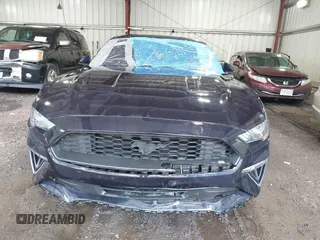 2021 Ford Mustang EcoBoost z VIN 1FA6P8TH4M5126706, wystawiony jako IAAI lot #42465164 z przebiegiem 49 795 mil mil oraz . Historia ofert i sprzedaży dostępna na DreamBid. Obrazek 6.