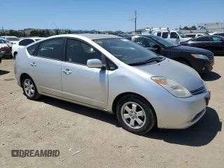 2004 Toyota Prius with VIN JTDKB20U240047067, listed as a Copart auction lot 56230125 with 164,662 mi miles and Salvage Title. Bid and sale history available at DreamBid. Image 4.