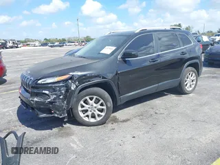 2015 Jeep Cherokee Latitude with VIN 1C4PJLCB4FW683904, listed as a IAAI auction lot 41579059 with 126,156 mi miles and . Bid and sale history available at carsss.com. Image 17.