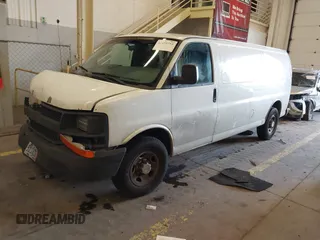 2011 Chevrolet Express Cargo Van with VIN 1GCWGGFAXB1122893, listed as a IAAI auction lot 41695753 with 232,658 mi miles. Bid and sale history available at carsss.com. Image 2.
