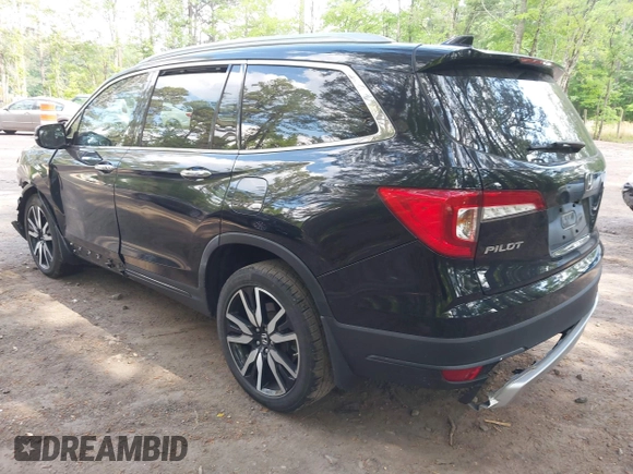 2019 Honda Pilot Touring 7-Passenger with VIN 5FNYF6H60KB030990, listed as a IAAI auction lot 42160762 with 68,807 mi miles and . Bid and sale history available at DreamBid. Image 3.