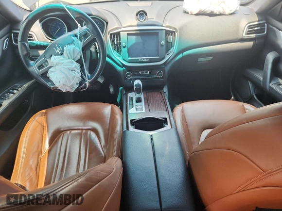 2014 Maserati Ghibli S Q4 with VIN ZAM57RTA5E1122165, listed as a Copart auction lot 60257835 with Not provided miles and Salvage title. Bid and sale history available at DreamBid. Image 8.