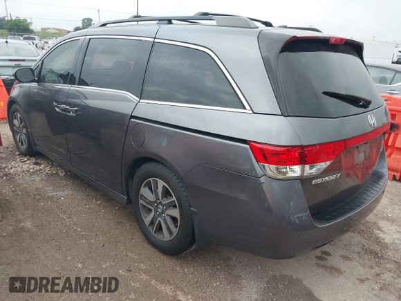 2016 Honda Odyssey Touring Elite with VIN 5FNRL5H96GB063176, listed as a IAAI auction lot 42157604 with 106,177 mi miles. Bid and sale history available at carsss.com. Image 3.