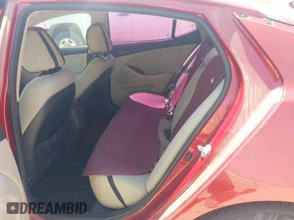 2013 Kia Optima LX with VIN 5XXGM4A7XDG247696, listed as a IAAI auction lot 42013026 with 119,209 mi miles. Bid and sale history available at carsss.com. Image 8.