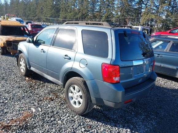 2010 Mazda Tribute Touring with VIN 4F2CY9C73AKM04595, listed as a IAAI auction lot 40797681 with 122,774 mi miles. Bid and sale history available at carsss.com. Image 3.