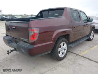 2014 Honda Ridgeline RTL with VIN 5FPYK1F52EB010700, listed as a IAAI auction lot 41490401 with 180,947 mi miles. Bid and sale history available at carsss.com. Image 4.