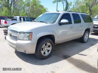2007 Chevrolet Suburban LT with VIN 3GNFK16367G246091, listed as a IAAI auction lot 42105259 with 216,014 mi miles. Bid and sale history available at carsss.com. Image 2.