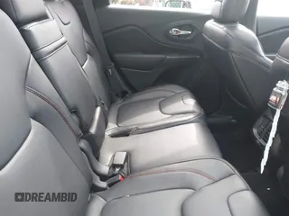 2014 Jeep Cherokee Trailhawk with VIN 1C4PJMBS5EW240375, listed as a IAAI auction lot 41806725 with 127,705 mi miles. Bid and sale history available at carsss.com. Image 8.
