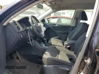 2013 Volkswagen Tiguan SE z VIN WVGBV3AX9DW603521, wystawiony jako Copart lot #59406465 z przebiegiem 133 647 mil mil oraz Szkoda całkowita • Salvage title. Historia ofert i sprzedaży dostępna na DreamBid. Obrazek 7.