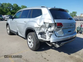 2019 Volkswagen Atlas SE with VIN 1V2UR2CA2KC557449, listed as a IAAI auction lot 42281302 with 106,739 mi miles and . Bid and sale history available at DreamBid. Image 3.