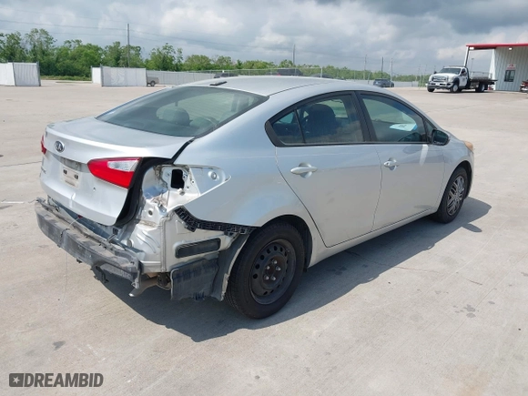 2014 Kia Forte LX with VIN KNAFK4A69E5248253, listed as a IAAI auction lot 42049489 with 154,541 mi miles. Bid and sale history available at carsss.com. Image 4.