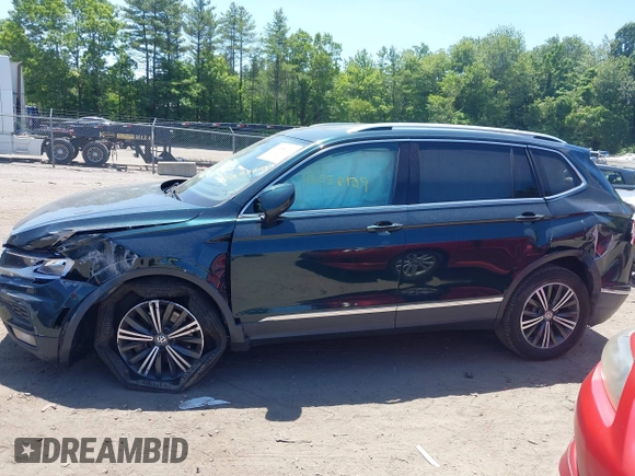 2018 Volkswagen Tiguan SEL with VIN 3VV2B7AX9JM058518, listed as a IAAI auction lot 42558129 with 82,807 mi miles and . Bid and sale history available at DreamBid. Image 14.
