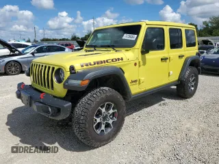 2022 Jeep Wrangler Unlimited Rubicon with VIN 1C4HJXFG3NW214174, listed as a Copart auction lot 74136484 with 5,292 mi miles and Salvage title. Bid and sale history available at DreamBid. Image 1.