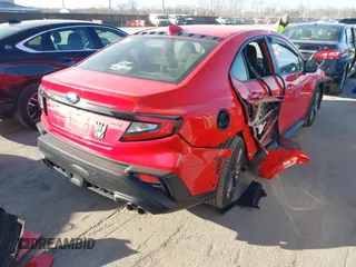 2022 Subaru WRX z VIN JF1VBAB69N8022472, wystawiony jako IAAI lot #41521034 z przebiegiem 23 303 mil mil oraz . Historia ofert i sprzedaży dostępna na DreamBid. Obrazek 4.