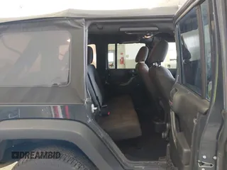 2017 Jeep Wrangler Unlimited Sport with VIN 1C4BJWDG3HL503676, listed as a IAAI auction lot 41953232 with 94,819 mi miles. Bid and sale history available at carsss.com. Image 8.