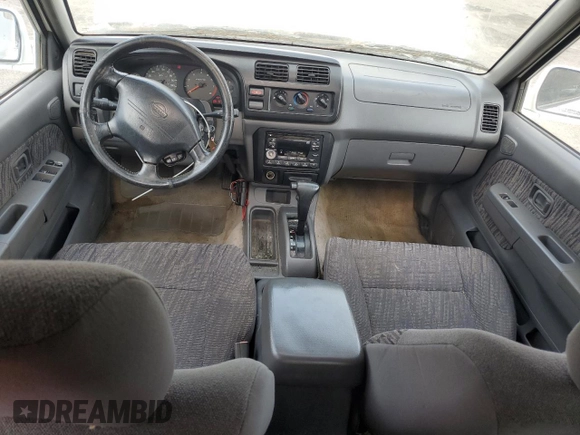 2000 Nissan Frontier XE with VIN 1N6ED27T1YC385792, listed as a Copart auction lot 62268225 with 291,906 mi miles and Salvage title. Bid and sale history available at DreamBid. Image 8.