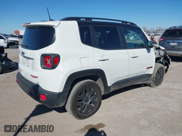 2018 Jeep Renegade Trailhawk with VIN ZACCJBCB1JPH28490, listed as a IAAI auction lot 41406910 with 76,003 mi miles. Bid and sale history available at carsss.com. Image 4.