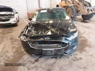 2019 Ford Fusion SE with VIN 3FA6P0HD3KR229021, listed as a IAAI auction lot 41576389 with 123,286 mi miles. Bid and sale history available at carsss.com. Image 6.