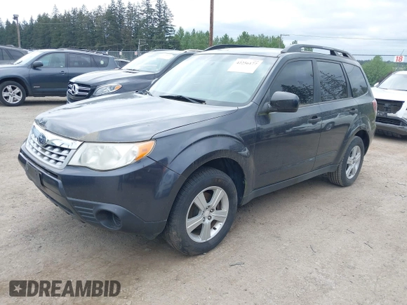 2012 Subaru Forester X with VIN JF2SHABC7CH404340, listed as a IAAI auction lot 42256177 with 163,828 mi miles and . Bid and sale history available at DreamBid. Image 2.