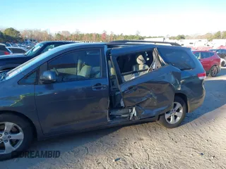 2011 Toyota Sienna LE AAS with VIN 5TDKK3DC2BS070656, listed as a IAAI auction lot 41034261 with 259,239 mi miles. Bid and sale history available at carsss.com. Image 6.