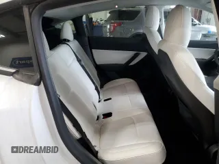 2022 Tesla Model Y Performance with VIN 7SAYGDEF9NF405370, listed as a Copart auction lot 43621095 with 52,292 mi miles and Salvage Title. Bid and sale history available at DreamBid. Image 10.