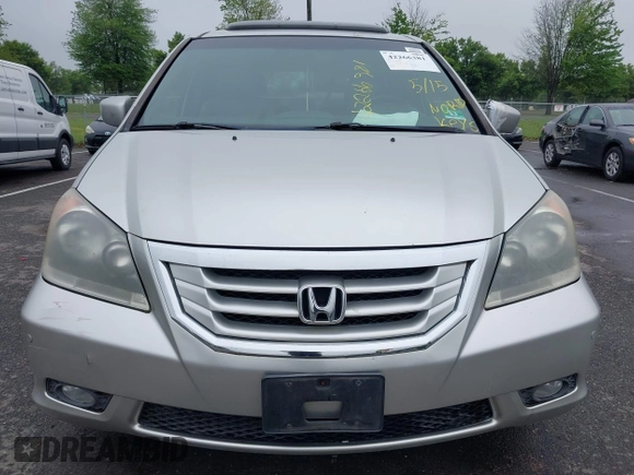 2009 Honda Odyssey Touring with VIN 5FNRL38859B029714, listed as a IAAI auction lot 42266381 with 196,747 mi miles and . Bid and sale history available at DreamBid. Image 6.