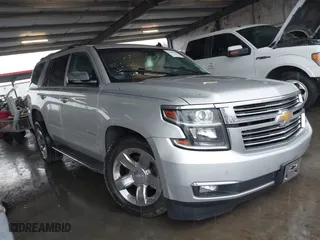 2015 Chevrolet Tahoe LTZ with VIN 1GNSCCKC5FR123099, listed as a IAAI auction lot 41391974 with 1 mi miles. Bid and sale history available at carsss.com. Image 1.