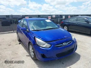 2013 Hyundai Accent GLS with VIN KMHCU4AEXDU437677, listed as a IAAI auction lot 42110350 with 144,947 mi miles. Bid and sale history available at carsss.com. Image 1.