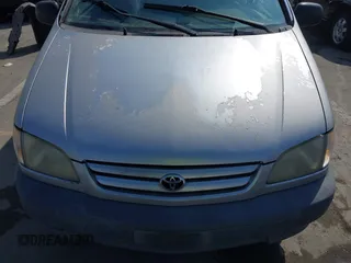 2001 Toyota Sienna LE with VIN 4T3ZF13C21U352205, listed as a IAAI auction lot 41904160 with 185,293 mi miles. Bid and sale history available at carsss.com. Image 6.