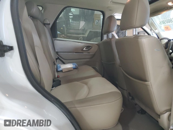 2005 Mercury Mariner Luxury z VIN 4M2CU57145DJ11612, wystawiony jako Copart lot #43980985 z przebiegiem 102 859 mil mil oraz Szkody całkowita. Historia ofert i sprzedaży dostępna na DreamBid. Obrazek 12.