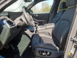 2024 BMW X5 xDrive50e with VIN 5UX43EU09R9U85438, listed as a Copart auction lot 46055885 with 7,742 mi miles and Salvage Title. Bid and sale history available at carsss.com. Image 7.