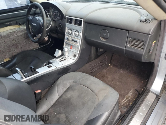 2005 Chrysler Crossfire z VIN 1C3AN79N35X039973, wystawiony jako Copart lot #44098695 z przebiegiem 109 161 mil mil oraz Czysty tytuł • Clean title. Historia ofert i sprzedaży dostępna na DreamBid. Obrazek 8.