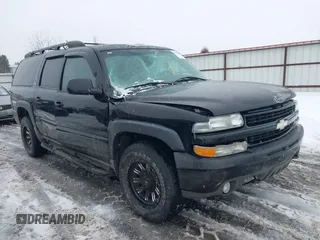 2003 Chevrolet Suburban LT z VIN 3GNFK16Z93G326483, wystawiony jako IAAI lot #41615404 z przebiegiem 177 819 mil mil oraz . Historia ofert i sprzedaży dostępna na DreamBid. Obrazek 1.