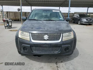2012 Suzuki Grand Vitara z VIN JS3TE0D59C4100035, wystawiony jako Copart lot #51780435 z przebiegiem 49 620 mil mil oraz Czysty tytuł • Clean title. Historia ofert i sprzedaży dostępna na DreamBid. Obrazek 5.