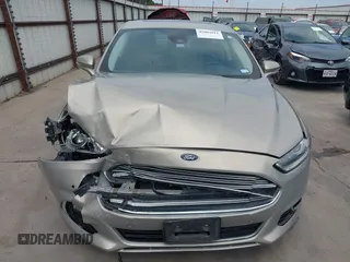 2015 Ford Fusion Energi Titanium with VIN 3FA6P0SU3FR114739, listed as a IAAI auction lot 42003011 with 120,553 mi miles. Bid and sale history available at carsss.com. Image 12.