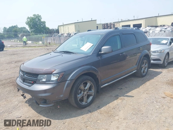 2015 Dodge Journey Crossroad with VIN 3C4PDCGG6FT511540, listed as a IAAI auction lot 42741561 with 166,041 mi miles and . Bid and sale history available at DreamBid. Image 2.