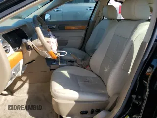 2008 Lincoln MKZ z VIN 3LNHM26T48R634178, wystawiony jako Copart lot #57401265 z przebiegiem 33 836 mil mil oraz Szkoda całkowita • Salvage title. Historia ofert i sprzedaży dostępna na DreamBid. Obrazek 7.