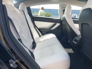 2019 Tesla Model 3 Long Range with VIN 5YJ3E1EB6KF192477, listed as a IAAI auction lot 41981600 with 62,888 mi miles. Bid and sale history available at carsss.com. Image 8.