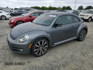 2012 Volkswagen Beetle 2.0T Turbo w/Sun/Snd/Nav PZEV with VIN 3VWVA7AT5CM630812, listed as a Copart auction lot 54419635 with 125,579 mi miles and Clean Title. Bid and sale history available at carsss.com. Image 1.