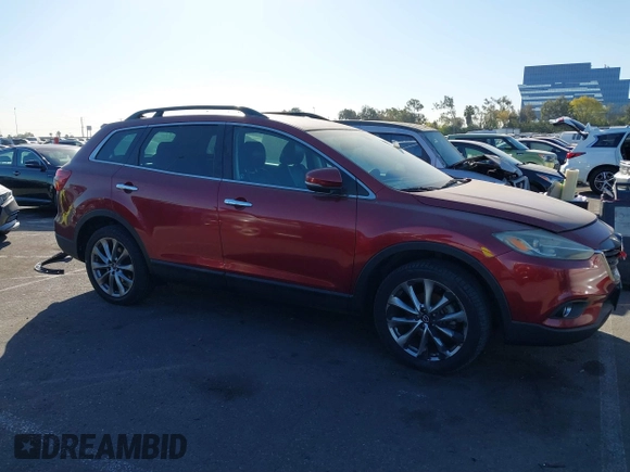 2014 Mazda CX-9 Grand Touring with VIN JM3TB3DV6E0435389, listed as a IAAI auction lot 41406200 with 181,598 mi miles and . Bid and sale history available at DreamBid. Image 13.